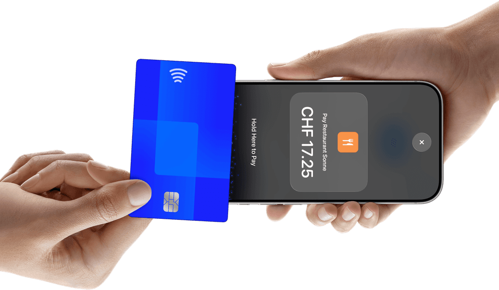 A credit card is held to an iPhone showing CHF 17.25.